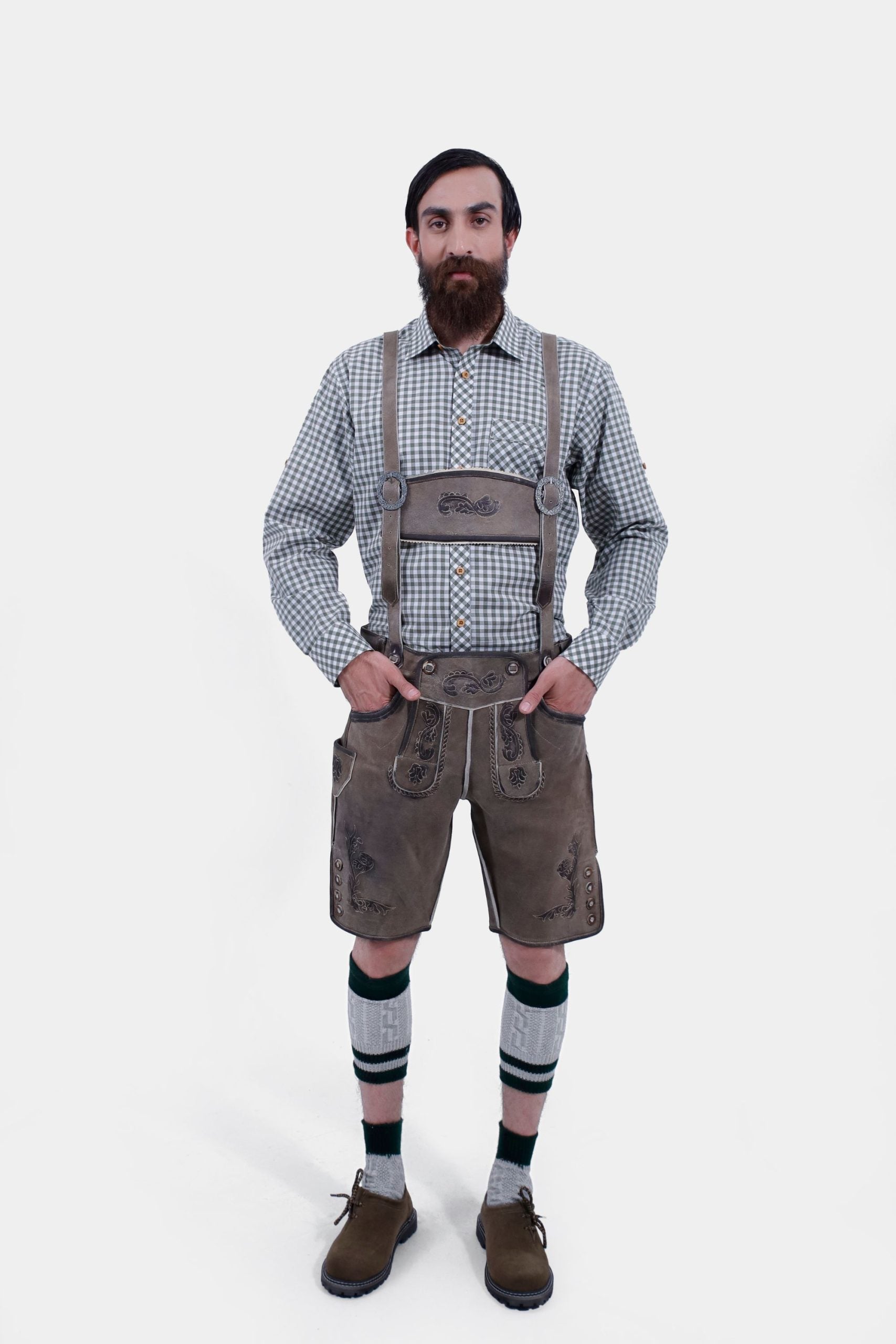 Man wearing Bavarian Woodland German Oktoberfest Suspender with a checkered shirt.
