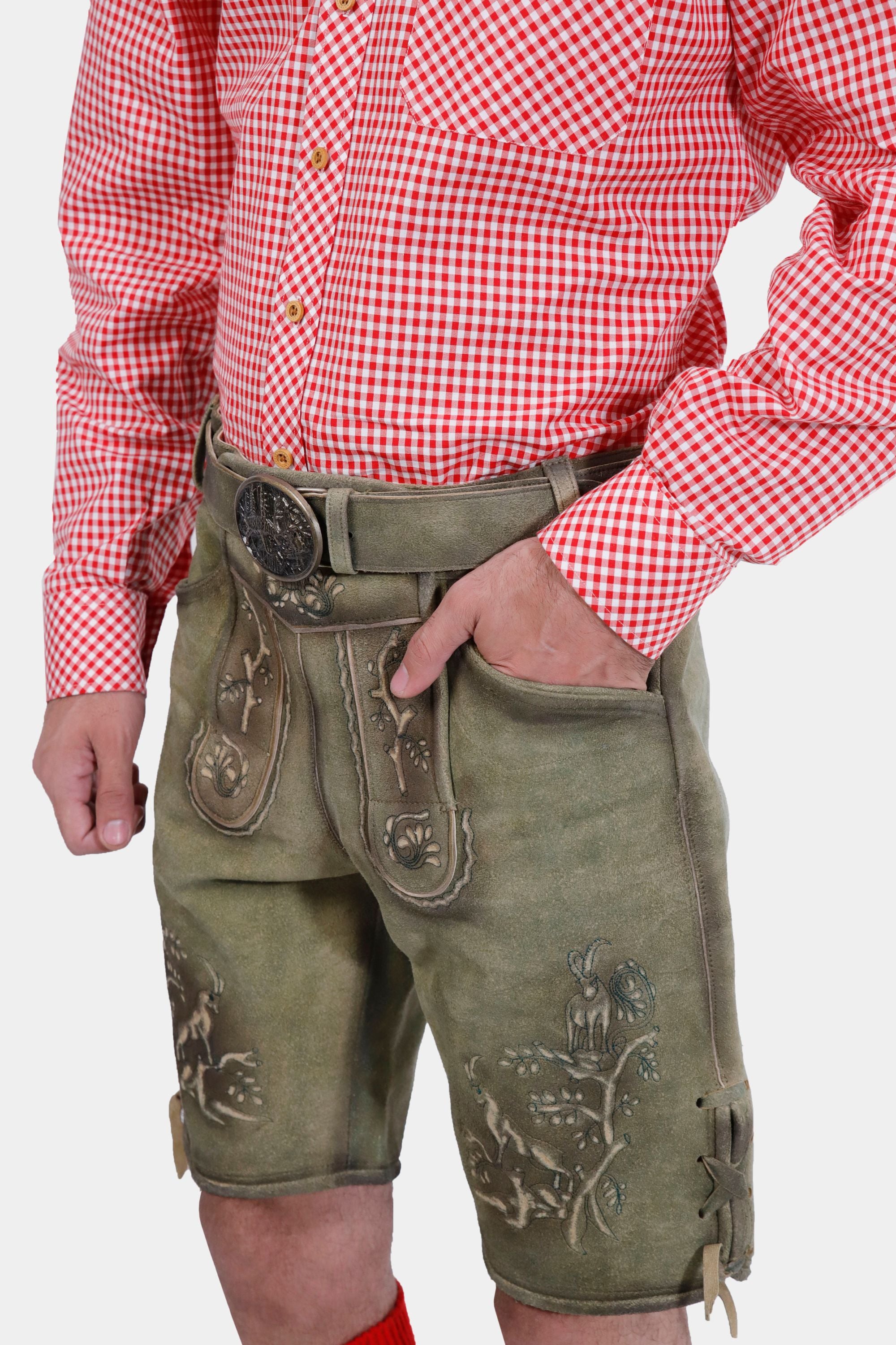 Side view of a man wearing traditional German lederhosen with a red checkered shirt, showcasing intricate embroidery.