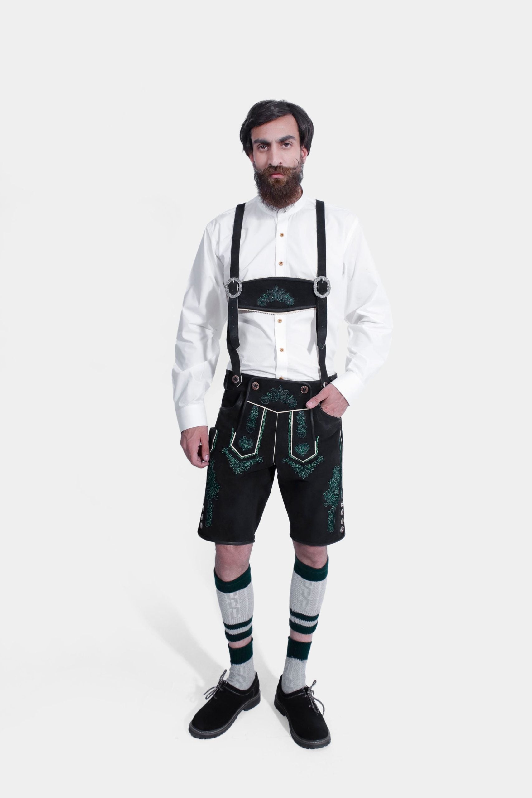 Man wearing Mystic Green German Oktoberfest Suspender with a white shirt.