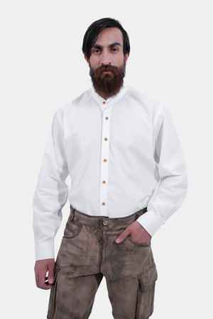 closed front view of a man wearing stamberg cargo long lederhosen paired with plain white shirt