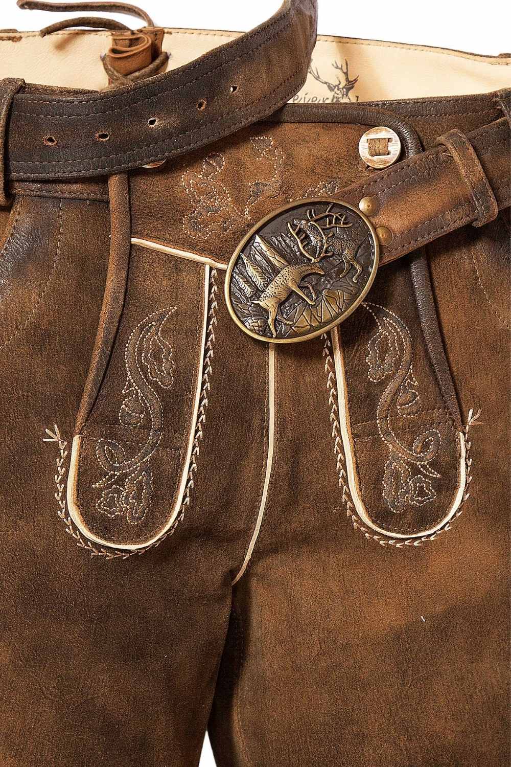 Close-up of black lederhosen mens shorts featuring delicate embroidery on the pockets and leg, highlighting craftsmanship for an authentic festival outfit.