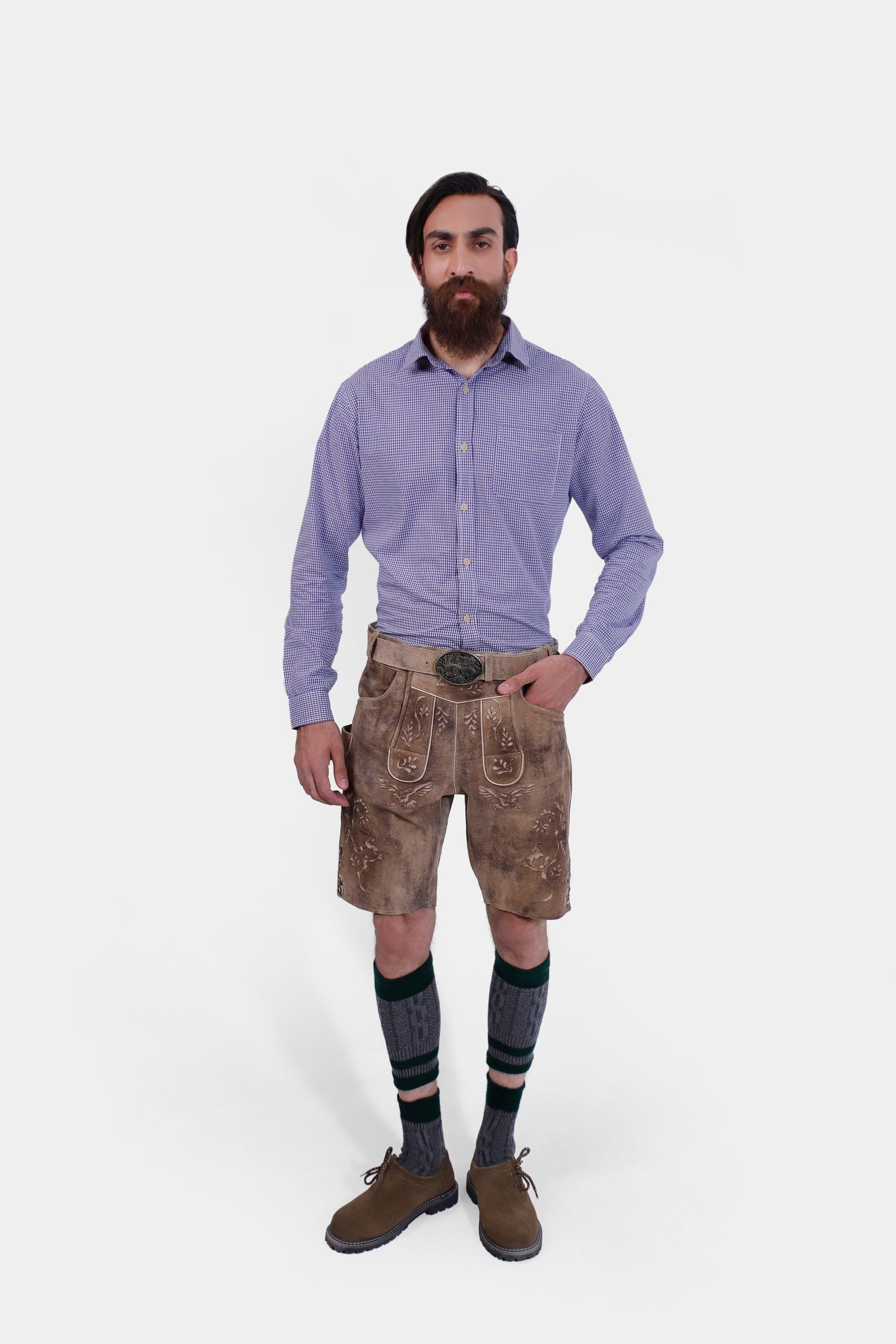 front view of the Alpine Eagle Lederhosen, focusing on the intricate natural embroidery and brown horn buttons on the leg cuffs.