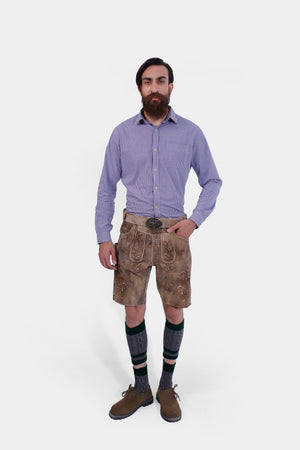 front view of the Alpine Eagle Lederhosen, focusing on the intricate natural embroidery and brown horn buttons on the leg cuffs.