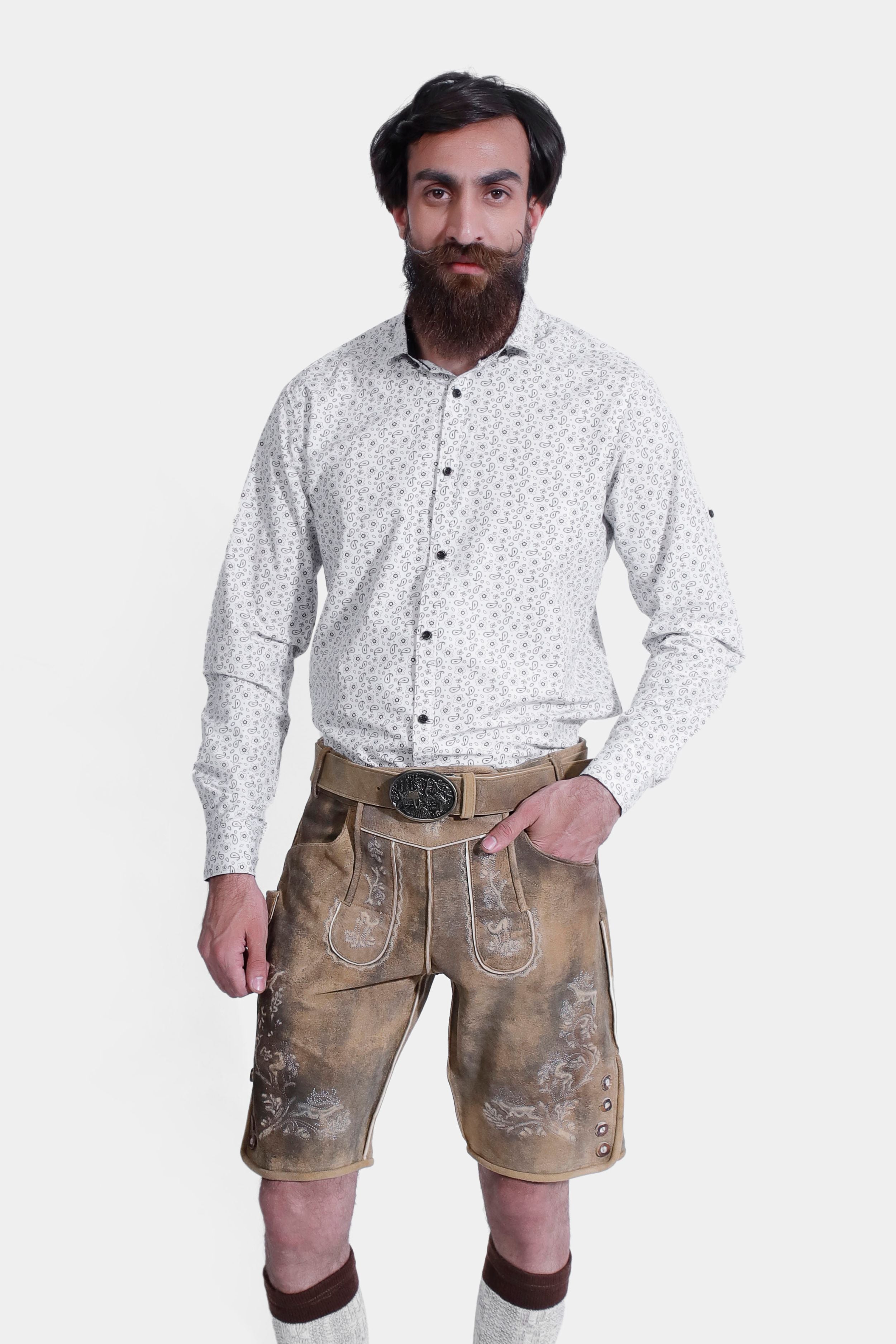 The man is shown from the back, displaying the front view of the lederhosen. The lederhosen are well-fitted and the back details include a small pocket and a strap for adjusting the fit.