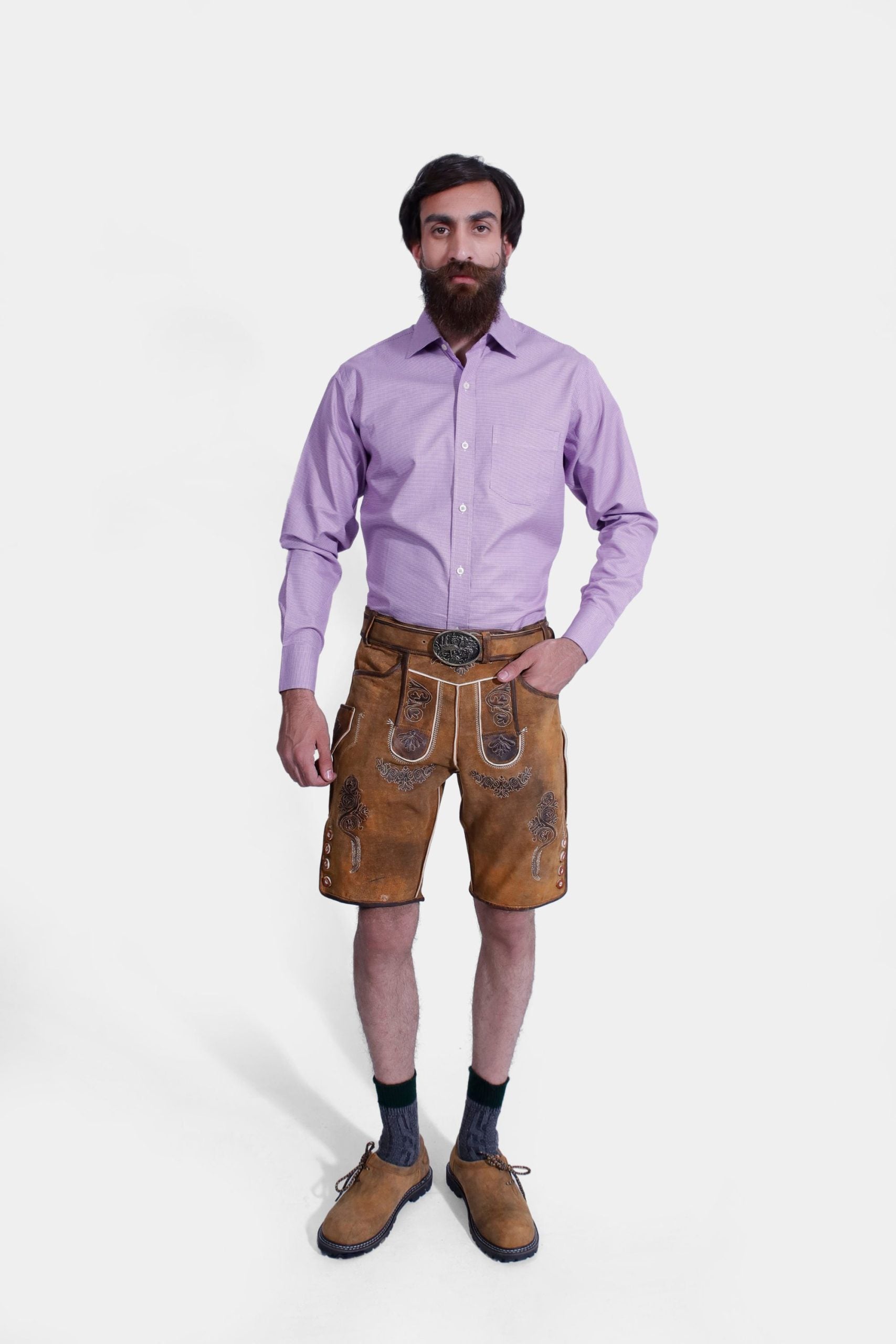 Man in Brecht Classic Lederhosen, Burnished Bronze with intricate embroidery and stylish buttons.