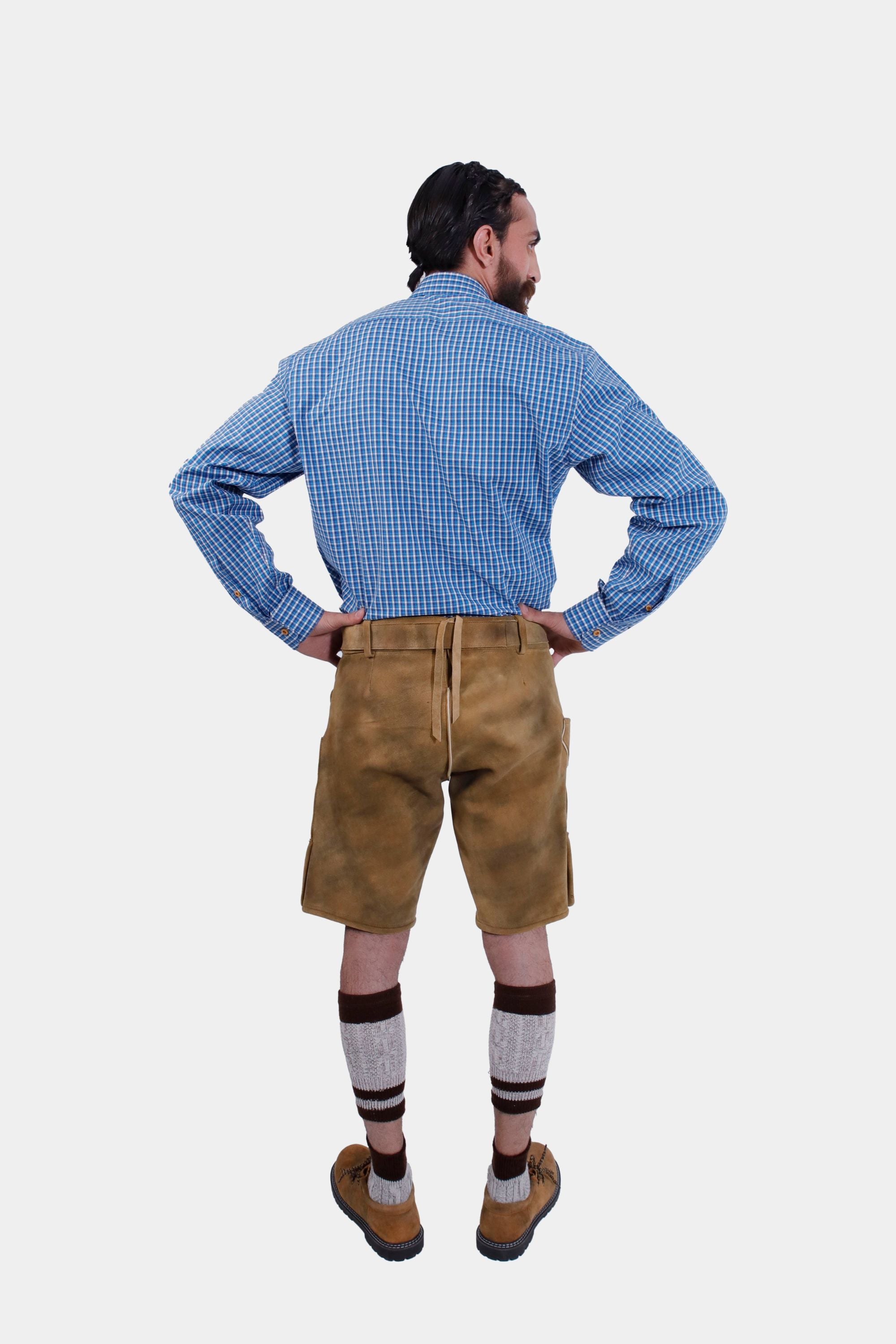 Full-length back view of a man in traditional lederhosen, highlighting the adjustable back waistband and overall fit.