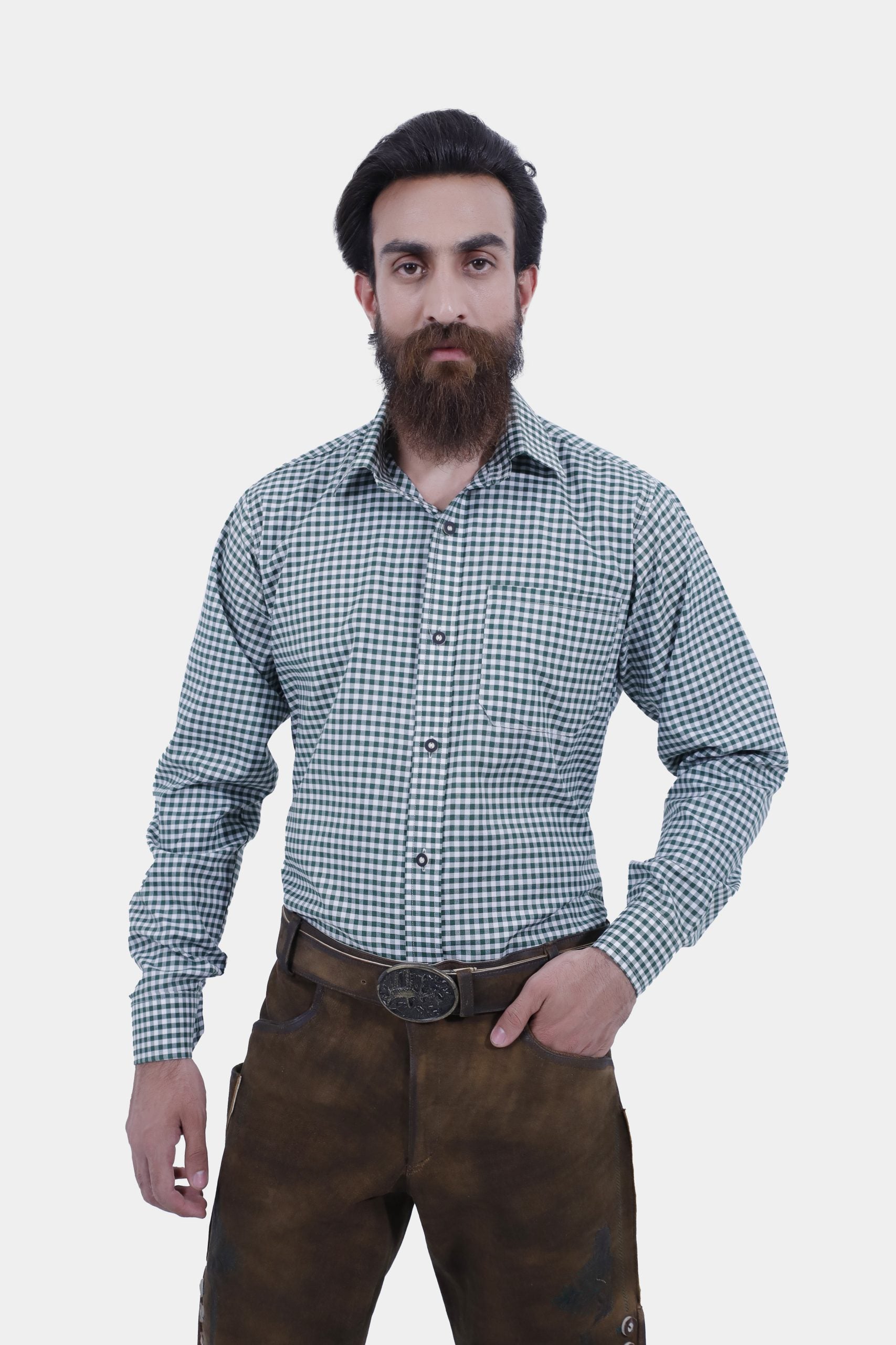 Close-up of a traditional Geneva Lederhosen belt with intricate silver buckle detailing, showcasing craftsmanship on brown leather.