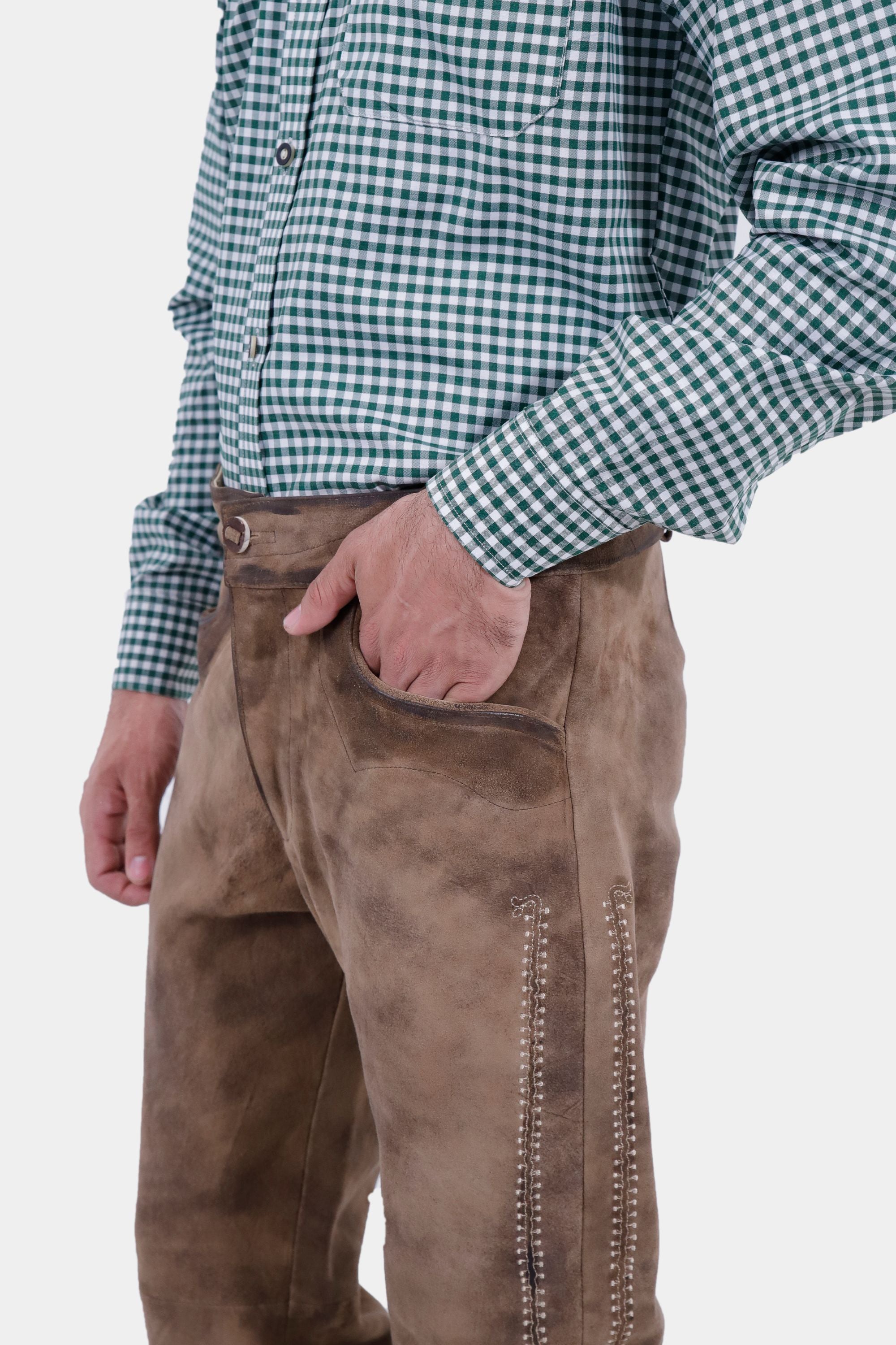 Closed side view of a man wearing Helsinki Long Lederhosen