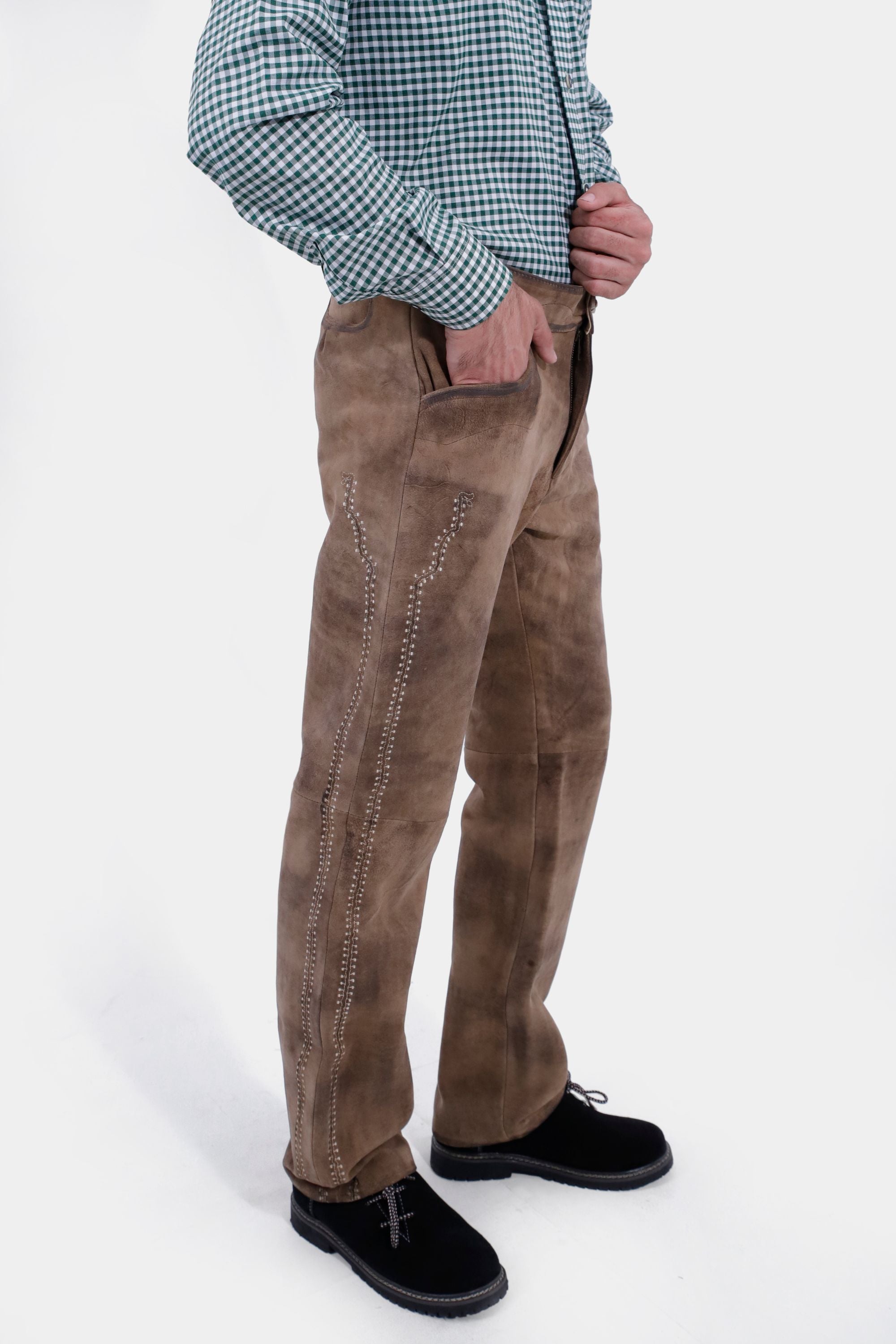 Closed side view of a man wearing Helsinki Long Lederhosen
