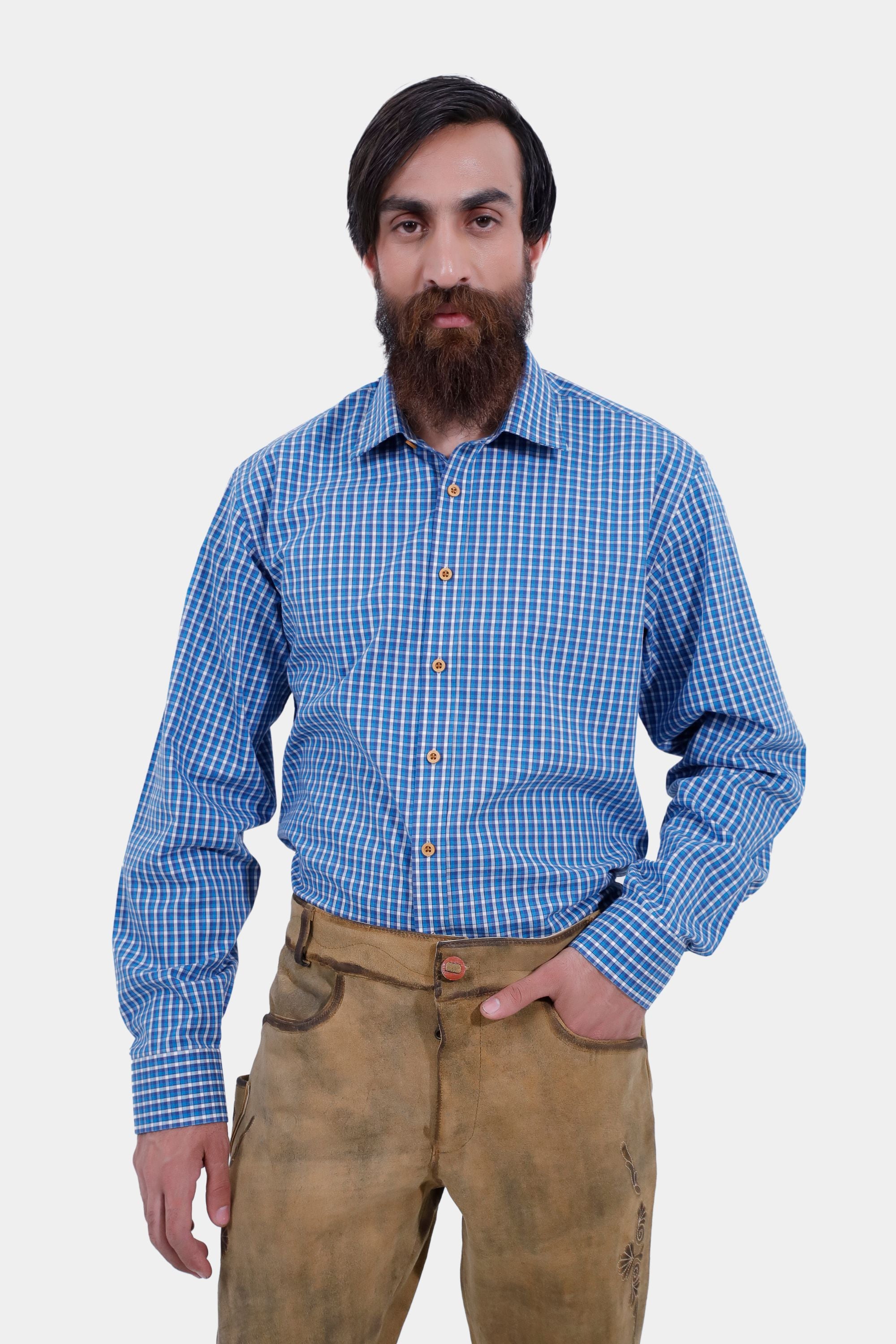 Closed front view of a man wearing Kochelsee Lederhosen Long pants paired with light blue checkered shirt
