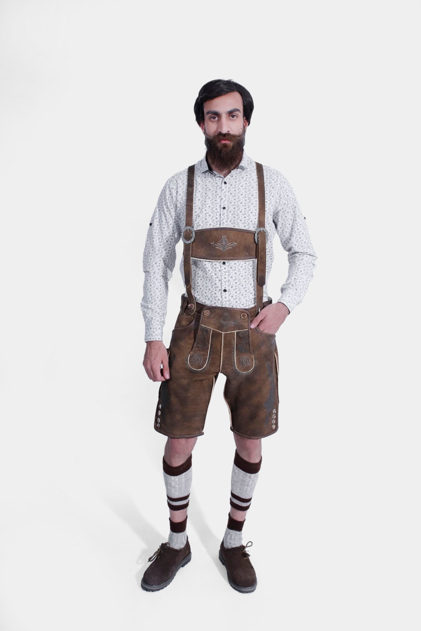 Man wearing Lechfall Legend Lederhosen Suspender with a patterned shirt.