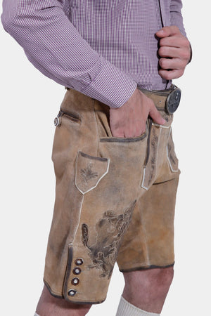 Closed Side View of a man wearing Short Traditional Lederhosen