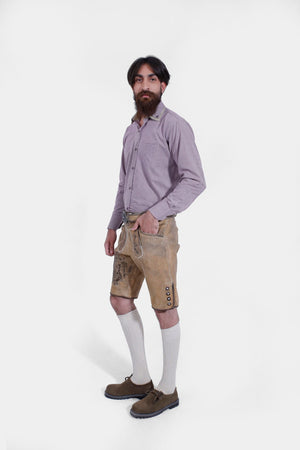 Complete Side View of a man wearing Short Traditional Lederhosen