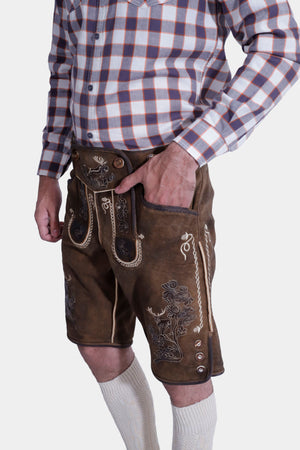 closed side view of man in Rustic Maple Max Planck Lederhosen with intricate embroidery and versatile pockets.
