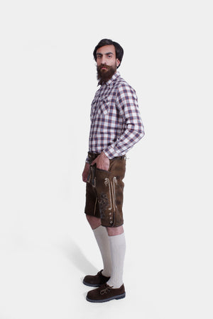 Side view of a man in Rustic Maple Max Planck Lederhosen with intricate embroidery and versatile pockets.