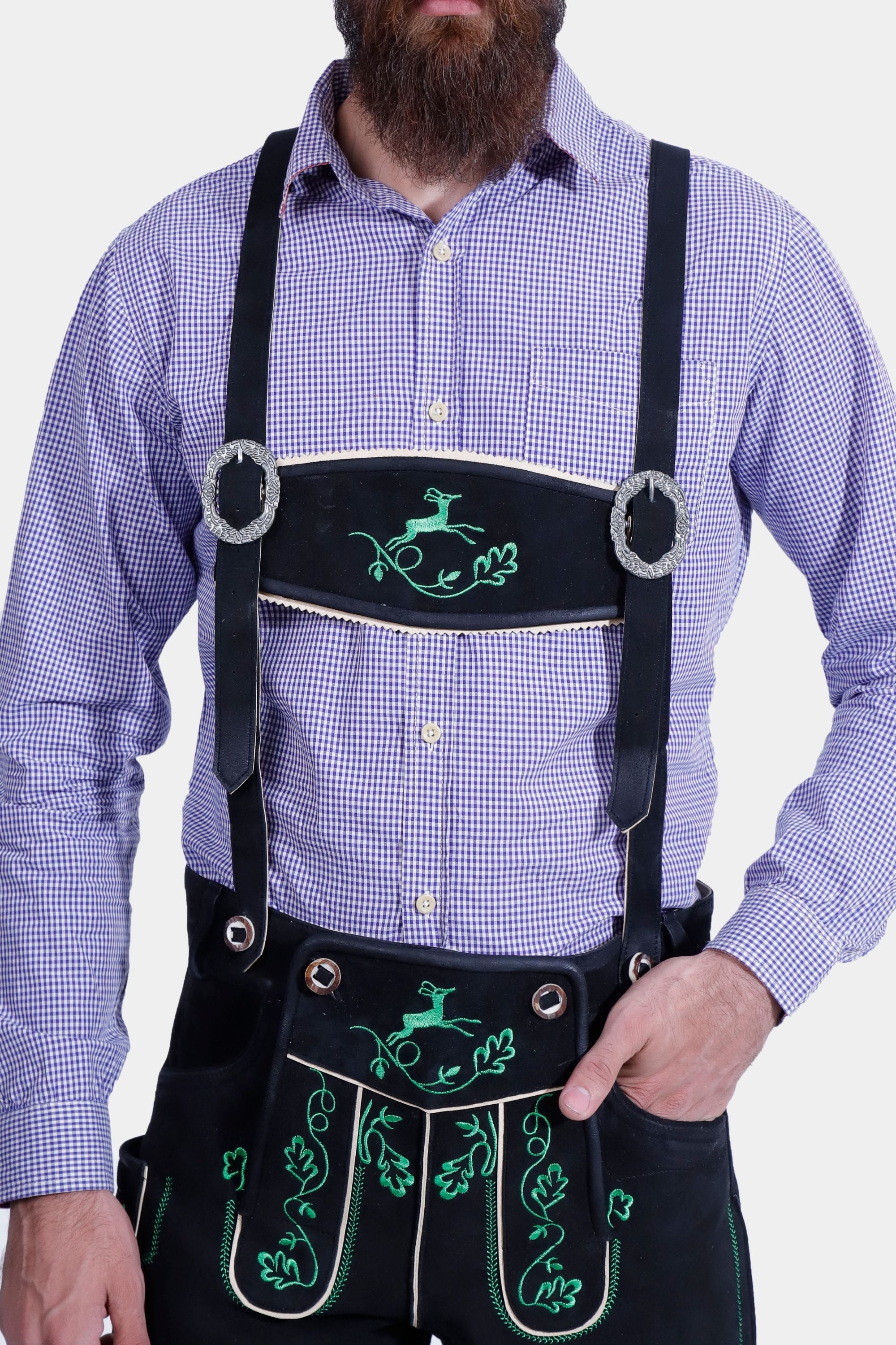 Rear view of a man wearing the Mueller Lederhosen, highlighting the back pockets and side ribbon ties, paired with a blue checkered shirt and green knee-length socks.