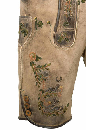 Side angle of lederhosen shorts men showing decorative buttons and side pockets, accentuating the worn leather look ideal for Oktoberfest.