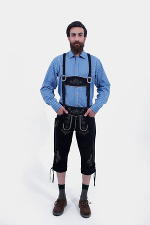 Man wearing Oktoberfest Elite German Lederhosen Suspender with a blue checkered shirt.