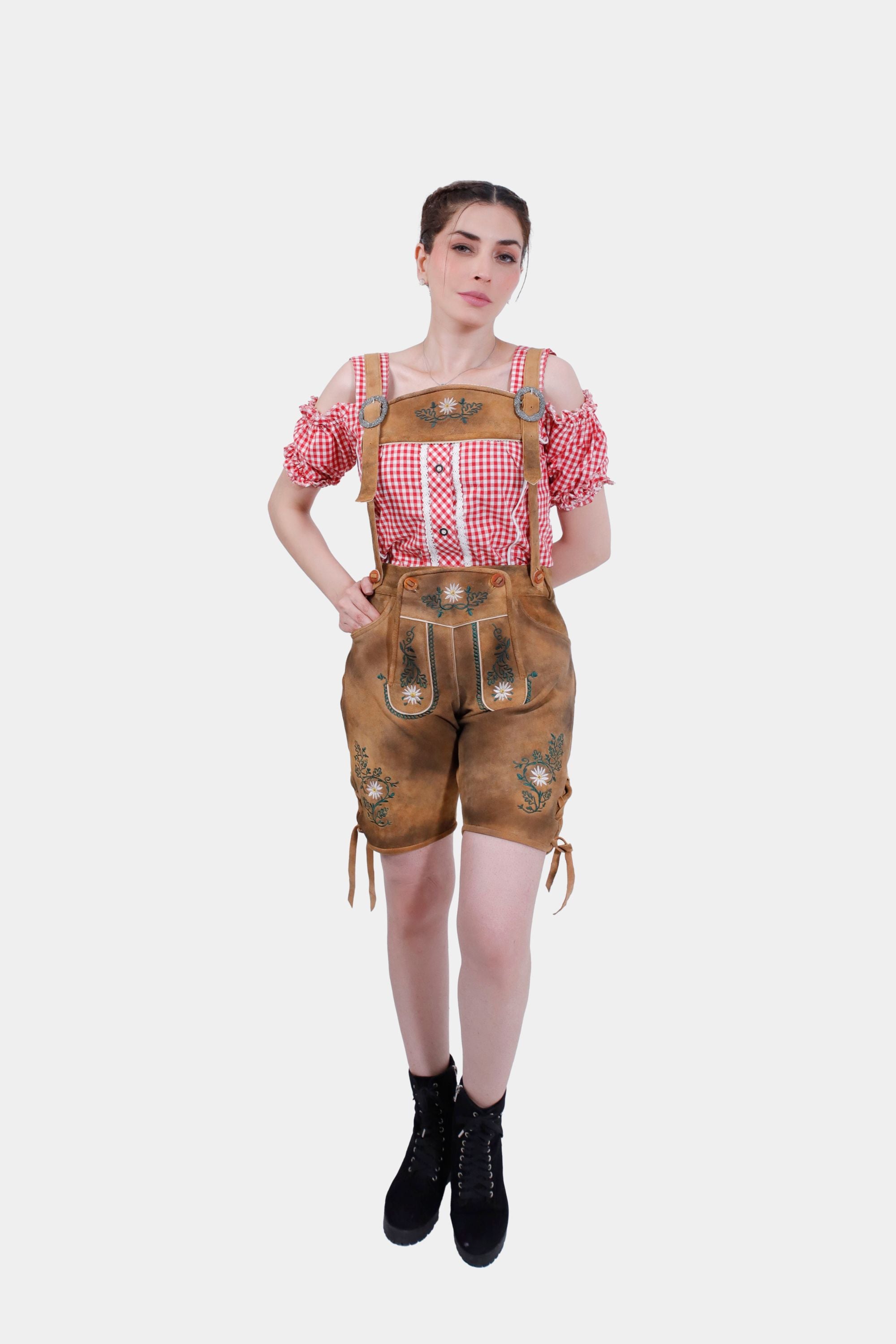Full body shot of the woman in Olivia Rodrigo Lederhosen, emphasizing the traditional design and Forest Honey color, paired with black boots and a red checkered top