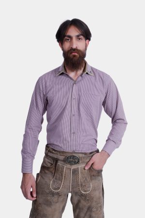 Man wearing "Chiemsee Castle Elite Lederhosen" in Opal Mist with intricate embroidery, paired with a checkered shirt.