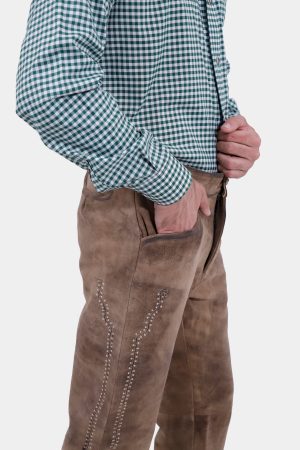Closed side view of a man wearing Helsinki Long Lederhosen