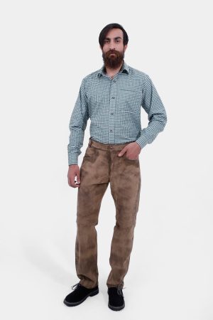Complete front view of a man wearing Helsinki Long Lederhosen Pants paired with green checkered shirt