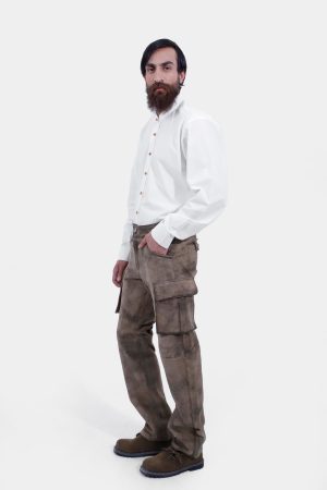 complete side view of a man wearing stamberg cargo long lederhosen paired with plain white shirt