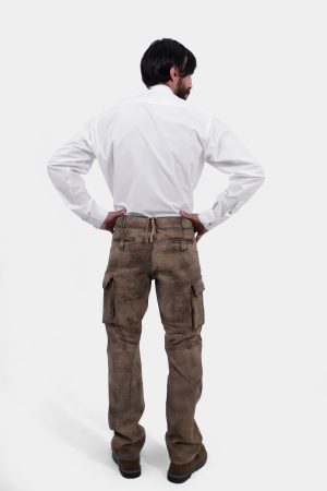 complete back view of a man wearing stamberg cargo long lederhosen paired with plain white shirt