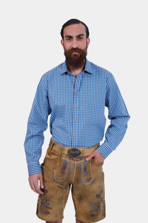 Close-up of the side pocket on Daniel Brühl Lederhosen showing intricate embroidery and a knife pocket.